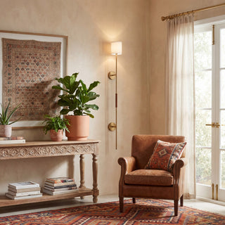 One Light Wall Sconce in Natural Brass with Leather Accent