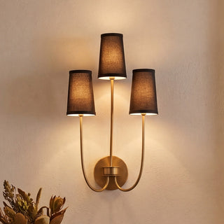 Three Light Wall Sconce in Natural Brass