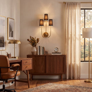 Three Light Wall Sconce in Natural Brass