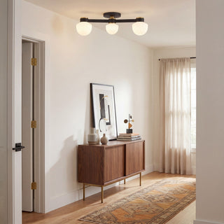 Three Light Semi-Flush Mount in Matte Black and Natural Brass
