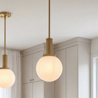 One Light Pendant in Natural Brass