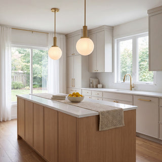 One Light Pendant in Natural Brass
