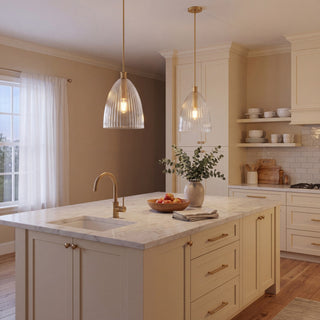 One Light Pendant in Natural Brass