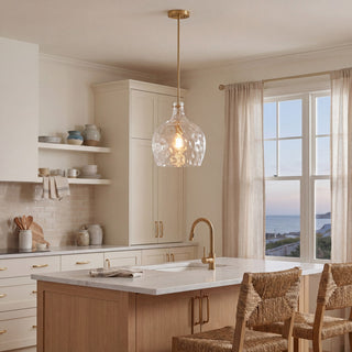 One Light Pendant in Natural Brass