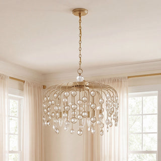Irina Six Light Chandelier in Noble Brass