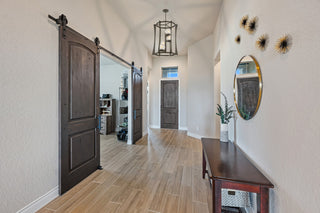 Darien Four Light Pendant in Mediterranean Bronze