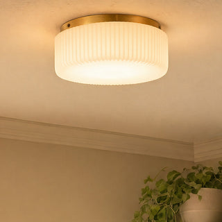 Edgemont Four Light Flush Mount in Warm Brass