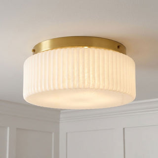 Edgemont Four Light Flush Mount in Warm Brass