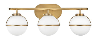 Hollis Medium Three Light Vanity in Heritage Brass