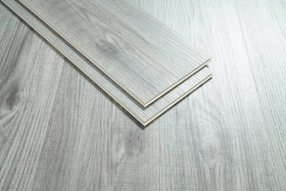 Luxury Vinyl Flooring 7 x 48 x 5.5mm 12 mil in Fossil oak Grey