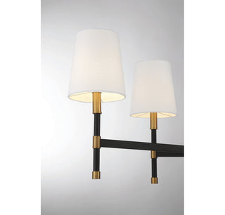Brody Six Light Linear Chandelier in Matte Black with Warm Brass Accents