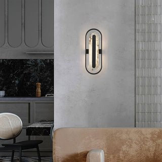 Roundabout LED Wall Sconce in Painted Antique Brass
