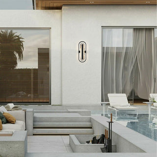 Roundabout LED Wall Sconce in Painted Antique Brass