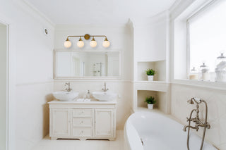 Hanson 4 lights bath sconce in brass with frosted shade