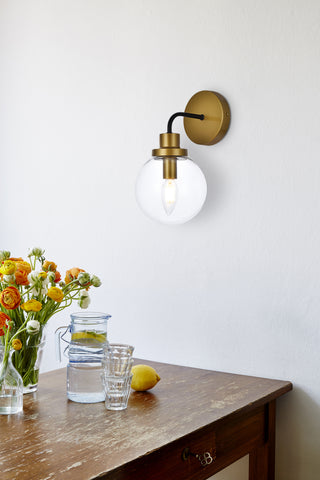 Hanson 1 light bath sconce in black with brass with clear shade