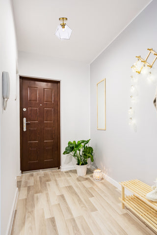 Lawrence 1 light brass and clear glass flush mount