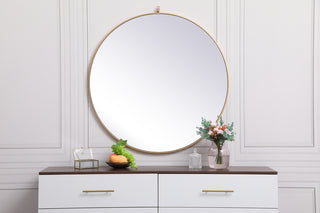 Metal frame round mirror with decorative hook 39 inch in Brass