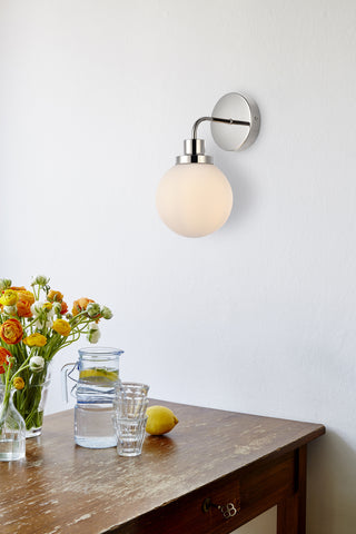 Hanson 1 light bath sconce in polished nickel with frosted shade