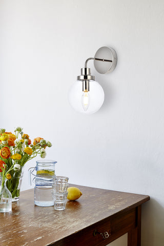 Hanson 1 light bath sconce in polished nickel with clear shade